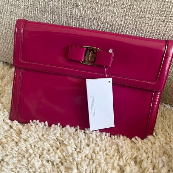Salvatore Ferragamo Handbags - Ferragamo Vara clutch NWOT